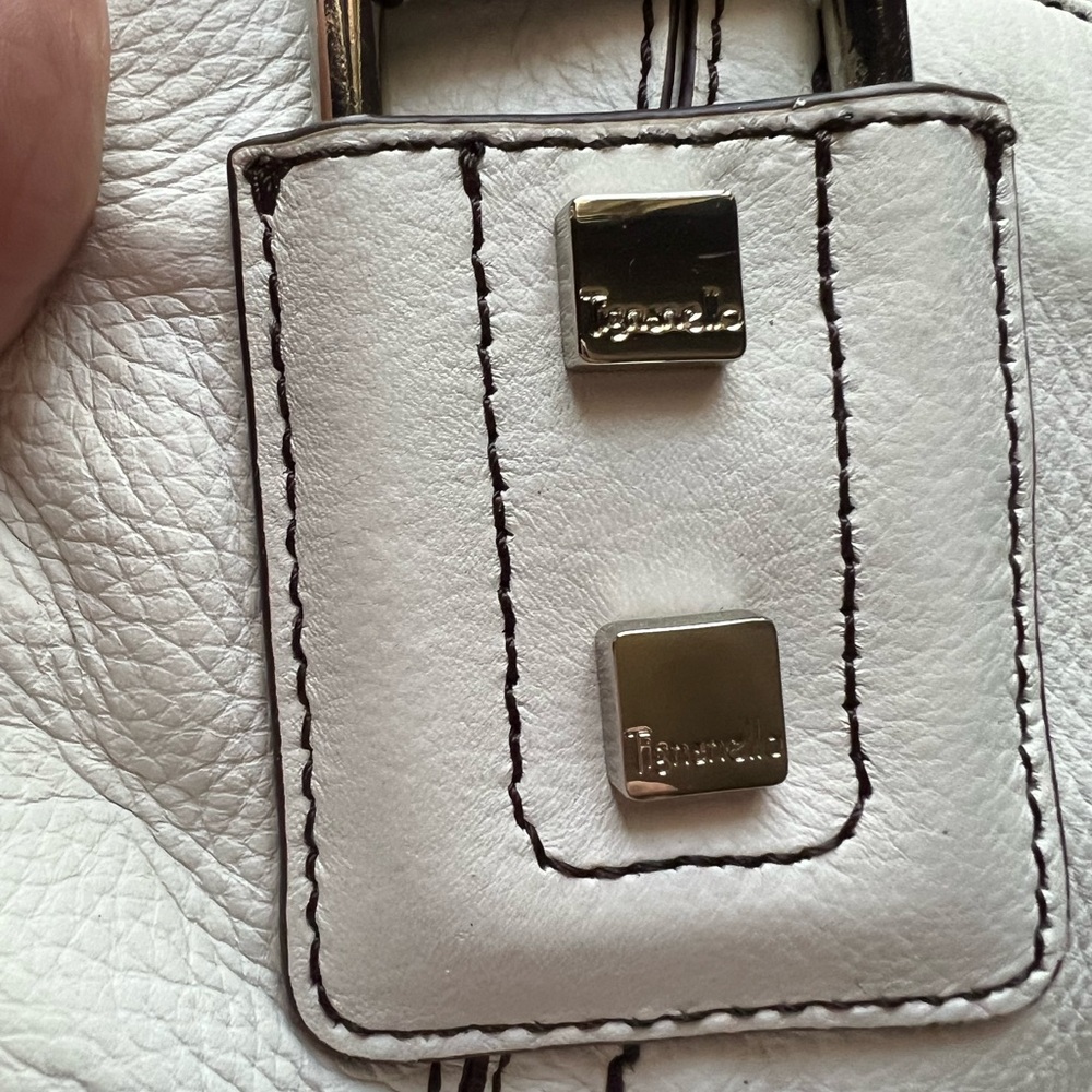 White leather Tignanello bag perfect condition never used priced to sell.